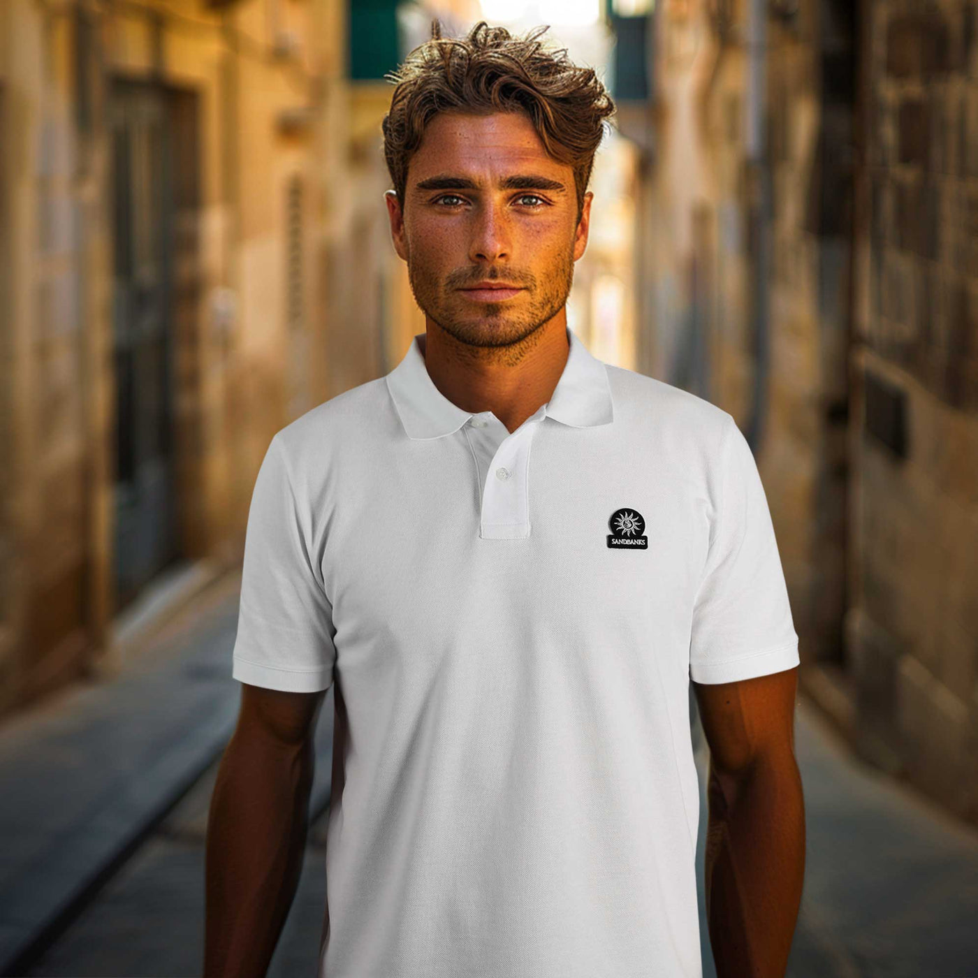 Sandbanks Badge Logo Polo Shirt in White Model