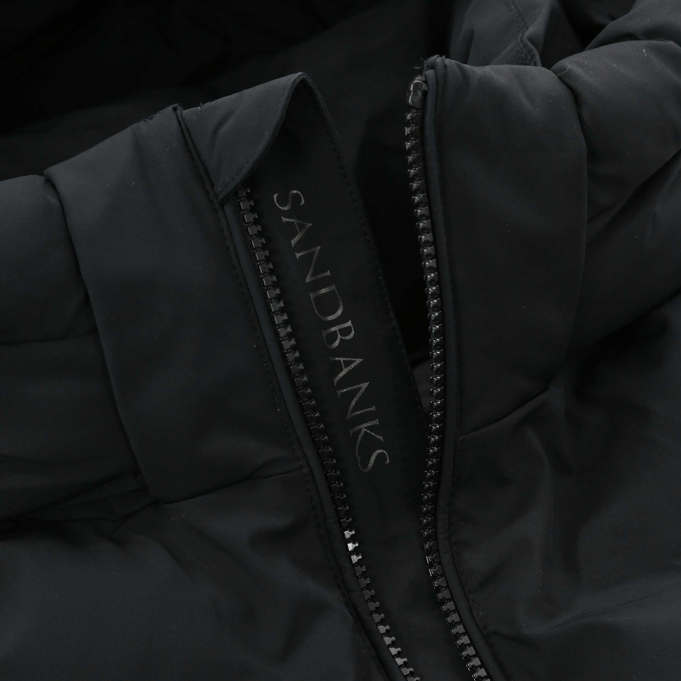 Sandbanks Waterproof Banks Puffer Jacket in Black Placket Logo